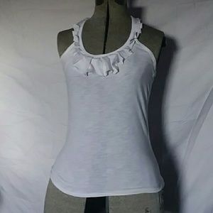 White frilly tank top.